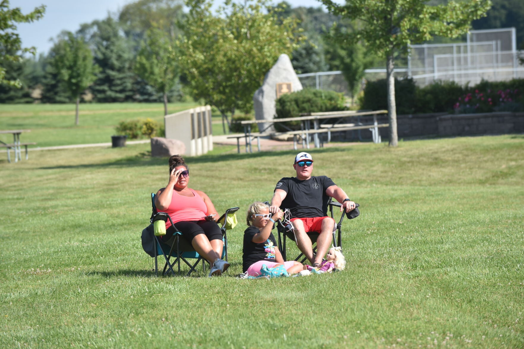 Watching from lawn chairs